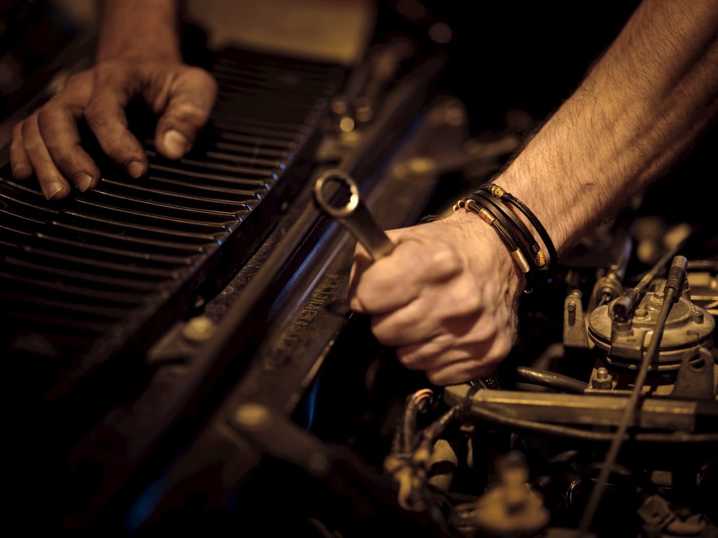 Summit Auto technician inspecting a vehicle